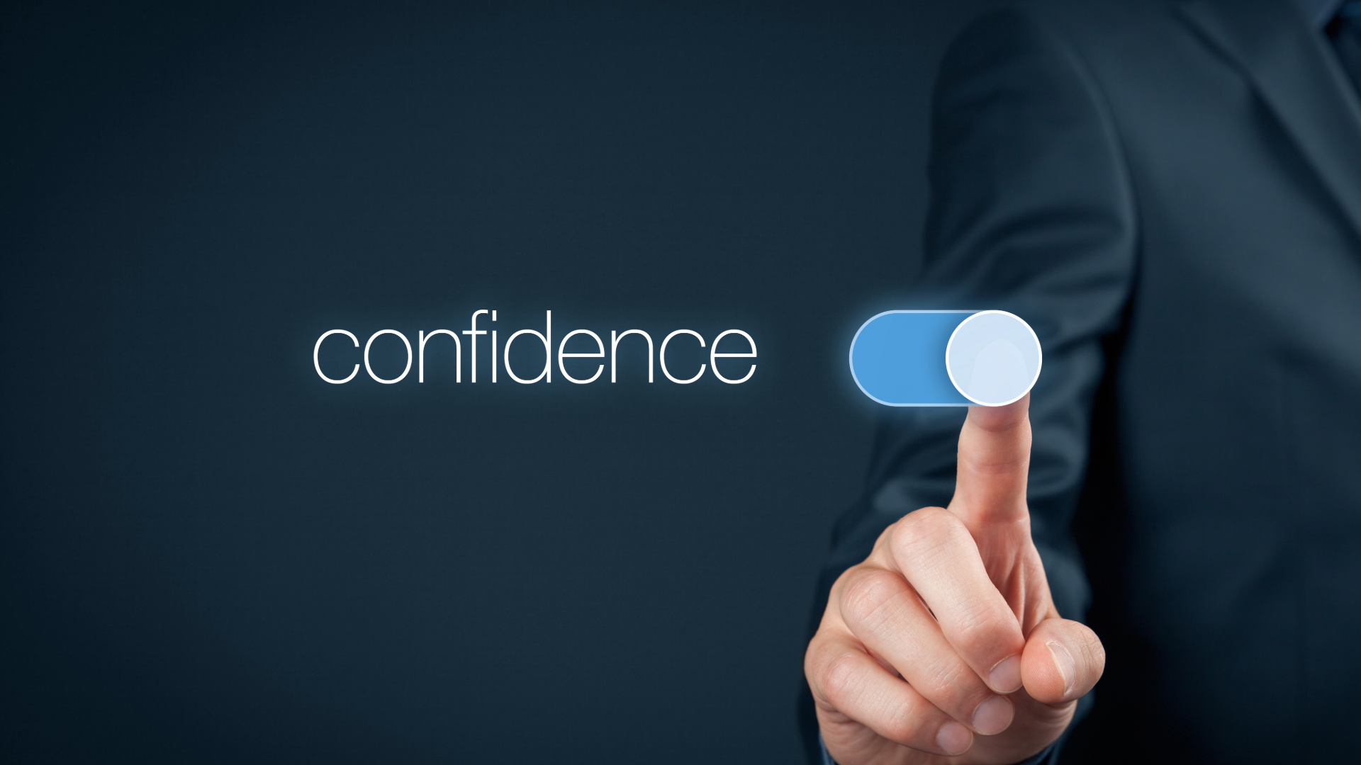 Hand reaching out to toggle on the word "confidence", representing the act of "turning on one's confidence"