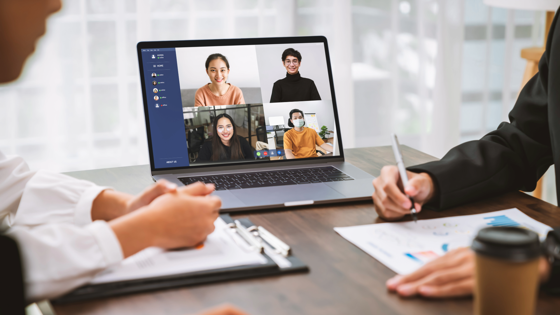 Business people using laptop on table with making video call meeting to team online and present work projects. Concept working from home.